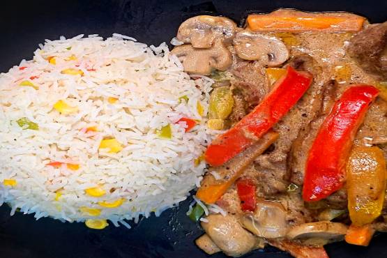 Beef Stroganoff with Butter Corn Rice and Bell Pepper