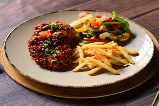 Grilled BBQ Chicken with Sauteed Vegetables and French Fries