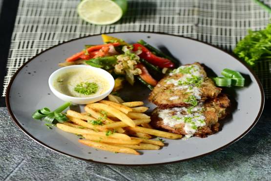 Grilled Fish with Sauteed Vegetables and French Fries