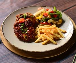 Grilled BBQ Chicken with Sauteed Vegetables and French Fries